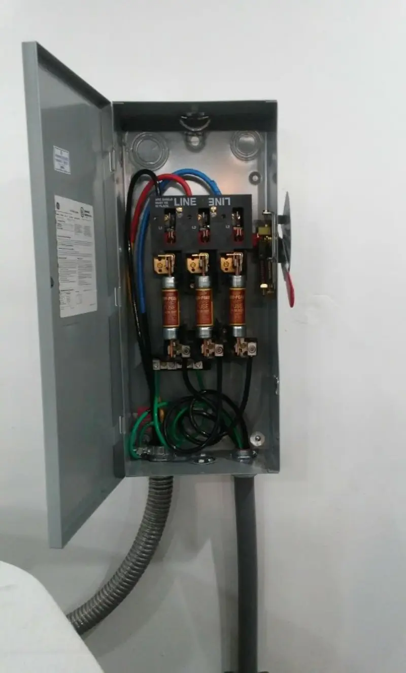 Three-phase disconnect switch installed for Smoke Detector Installation in Chincoteague